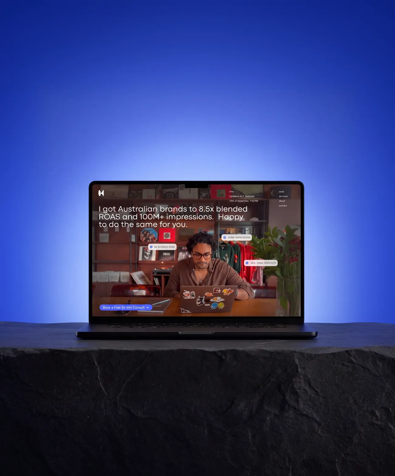 Website shown on a laptop in blue light